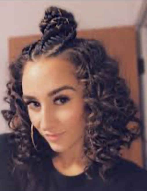 Half-up top knot curly hairstyle for women